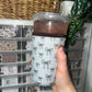 Graceful Sips: GG Neutral Bow Drink Sleeve
